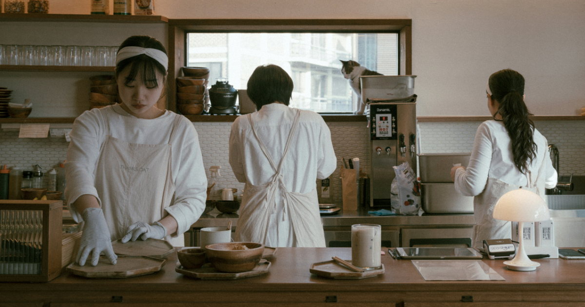 Women working in a kitchen.