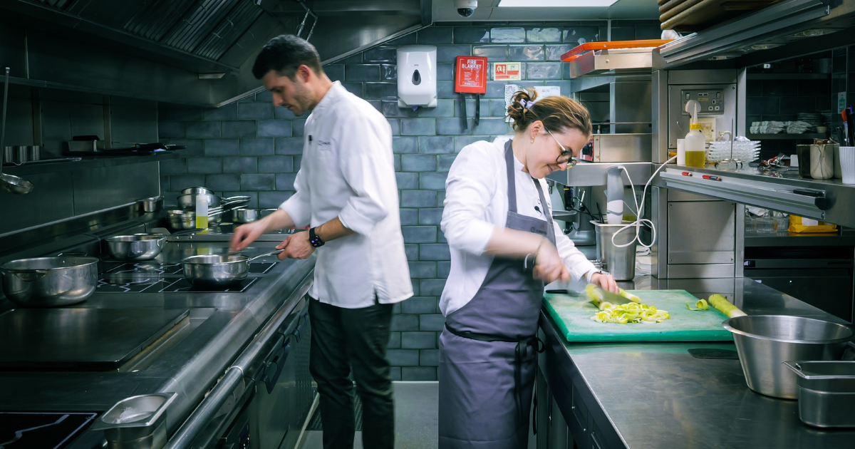Diego Ferrari and Emily Roux in the kitchen at Caractère