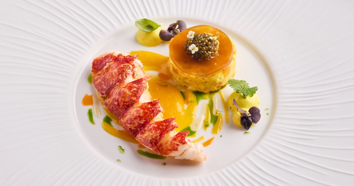 Warm lobster salad with mango, lime and cardamom vinaigrette and curried mayonnaise