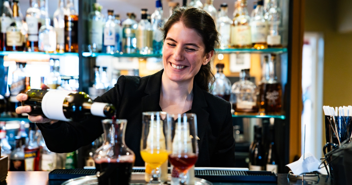 Cathryn Bell behind the bar at Grove of Narberth
