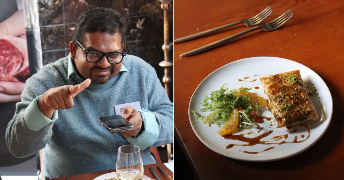 A happy guest and food at Arros QD