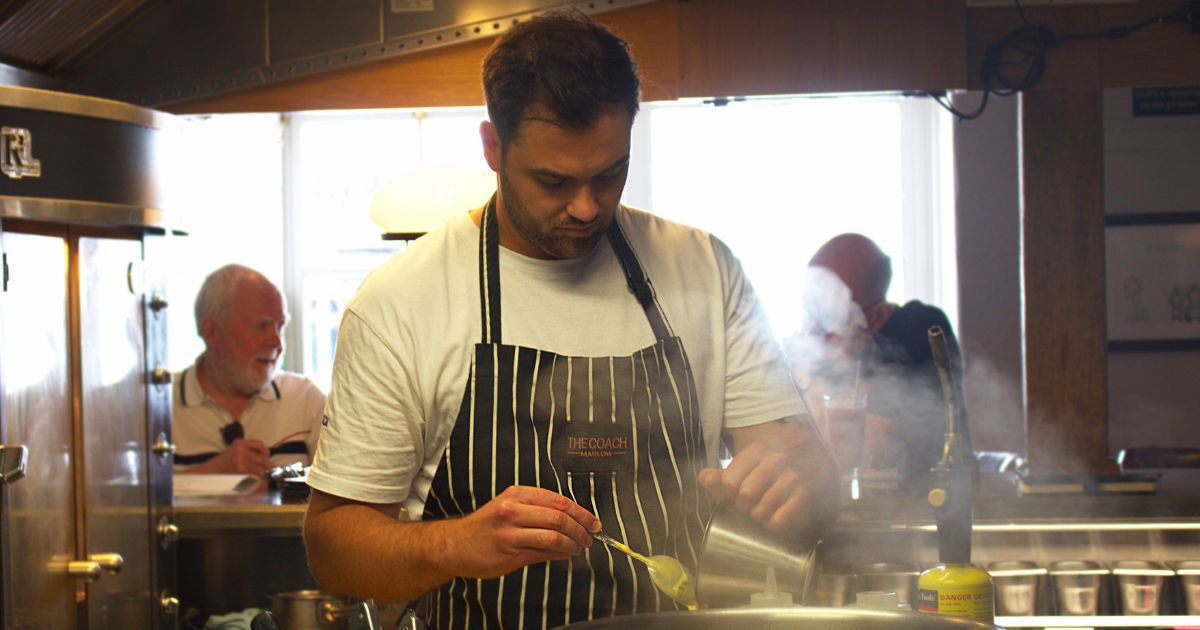 Brad Cacela in the kitchen at The Coach