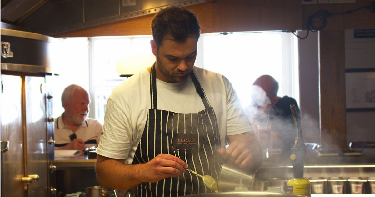 Brad Cacela cooking at The Coach
