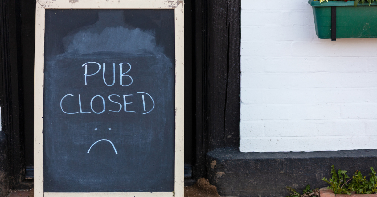 Pub closed sign in the UK