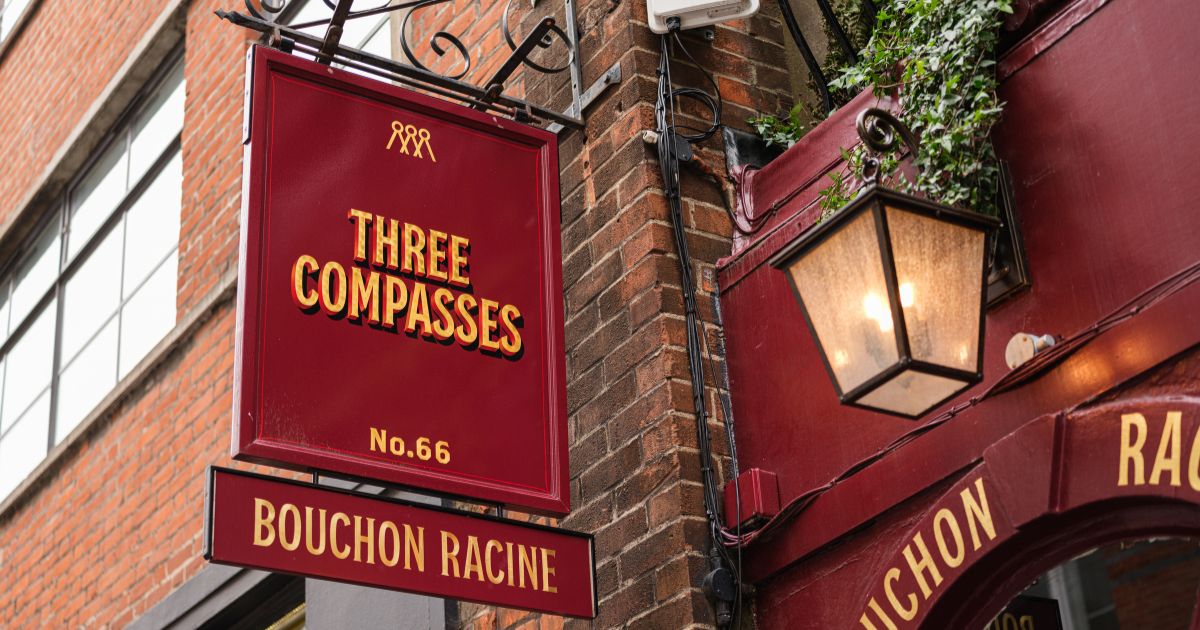 Three Compasses and Bouchon Racine sign