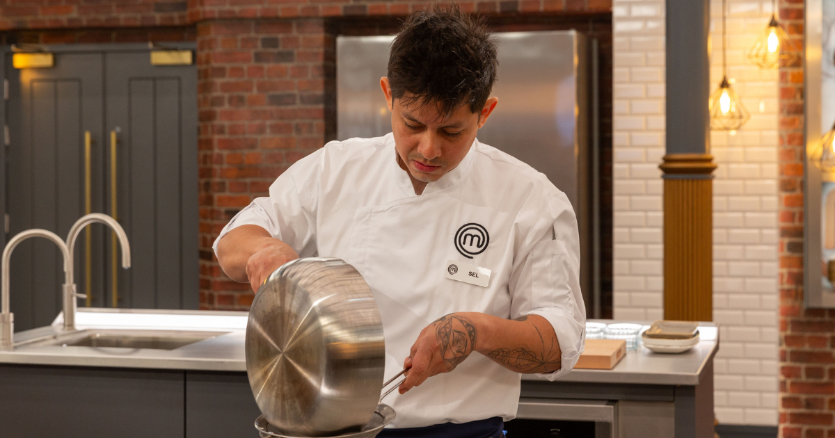 Sel Bracamonte in the kitchen at MasterChef: The Professionals