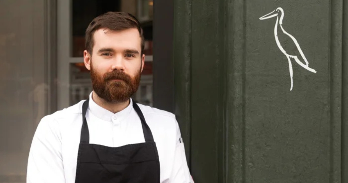 Sam Yorke stood outside Heron restaurant