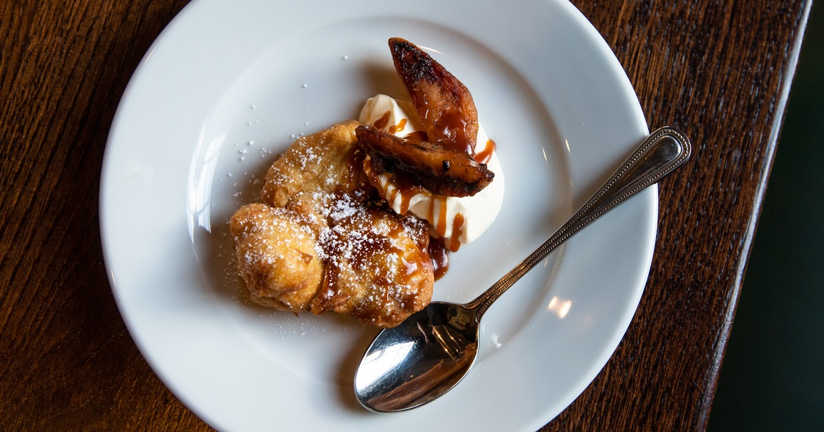Beignets, roast apples and cream by Lloyd Morse