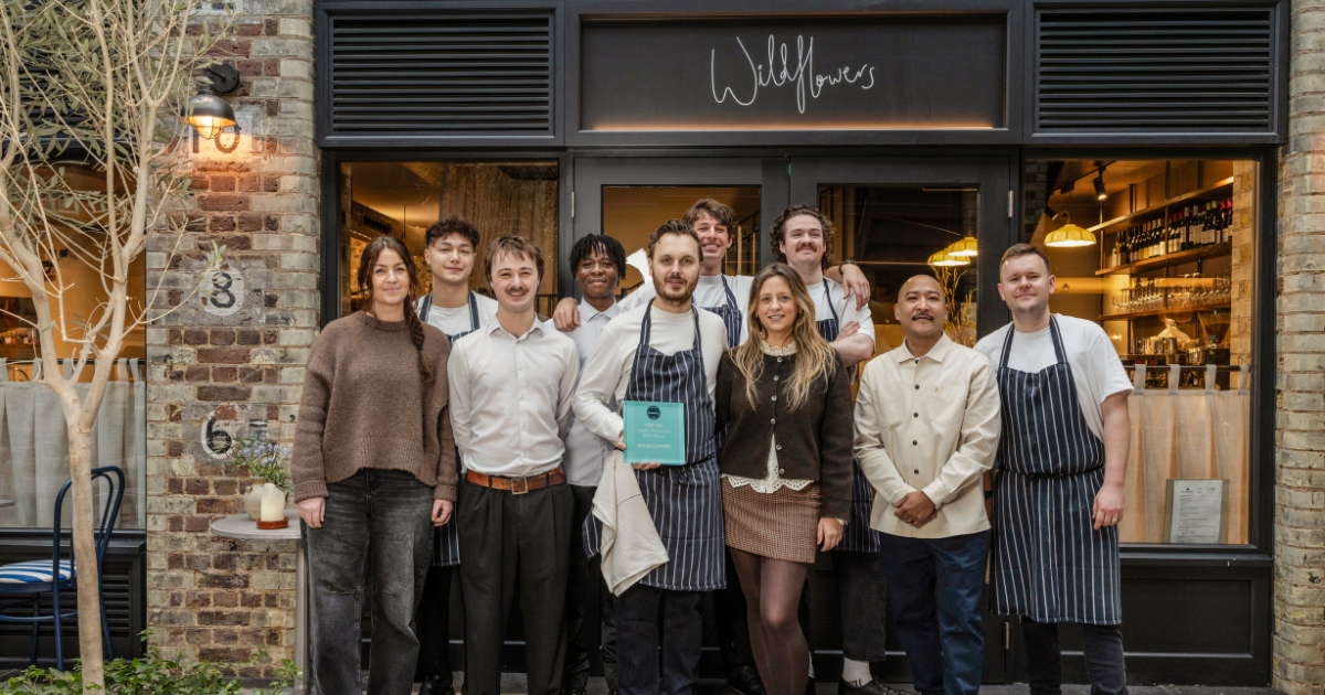 Wildflowers team holding SquareMeal plaque